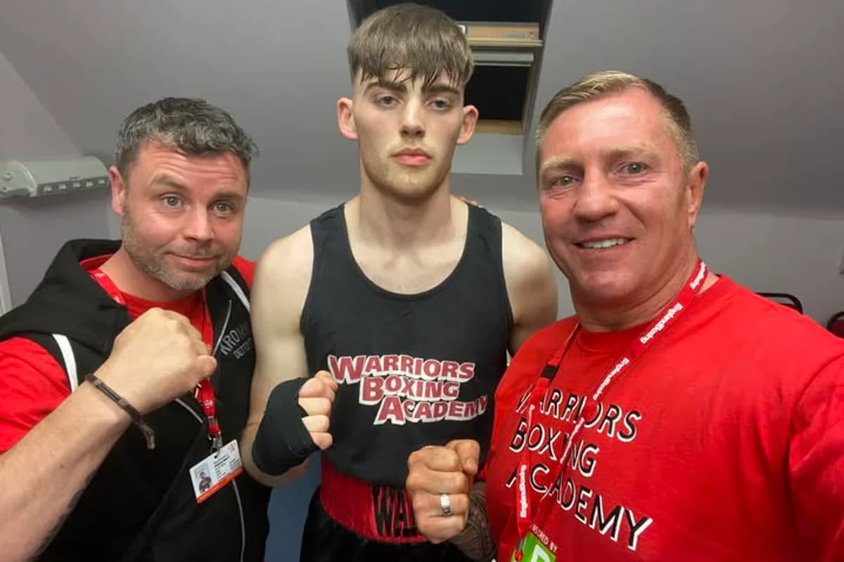 Warriors Boxing Academy coaches with boxer before a fight