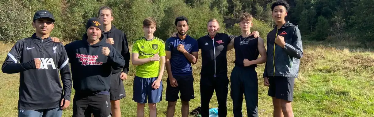 Warriors Boxing Academy squad training together outdoors